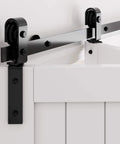 Close-up of black carbon steel track on bifold barn door for 32 inch closet, part of the Carbon Steel Bifold Barn Door Hardware Kit For 32 Inch Closet Doors 3ft Track Smooth Quiet Black.
