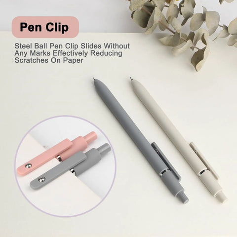 Close-up of Go To Gel Pens Set with pink and gray pens, showing retractable design and clip on white background.