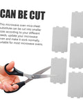 Scissors cutting 10 Piece Microwave Mica Insulation Sheets For Easy To Cut To Fit No Fuss Heat Resistant Waveguide Covers