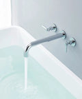 Wall Mount Tub Filler Chrome Faucet With Brass Construction, Double Handles, Ceramic Cartridge, water flowing into tub