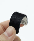 Close-up of black cow fur silencer strip with adhesive backing for Bow String Silencers Set For Recurve And Traditional Longbows.