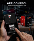 Person using app control on phone for iControl CUT55 Pro Plasma Cutter With App Control, 55 Amp Non-Touch Pilot Arc on workbench.