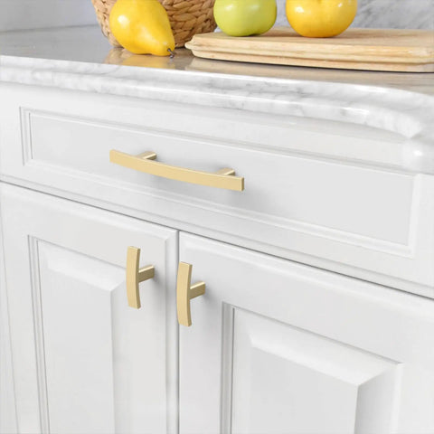 Super Dope Brushed Gold Cabinet Pulls For Kitchen And Bathroom Drawers 3 Inch Hole Centers Smooth Handle Set 10 Pack on white cabinets.