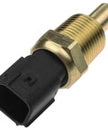 Close-up of brass coolant temperature sensor with threaded body and black plastic electrical connector.