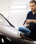 Man using orbital buffer with microfiber polisher pad bonnet from 20 Pack 5 To 6 Inch Microfiber Polisher Pad Bonnets For Orbital Buffers Easy Slip On Polishing Buffing Covers Durable Car Detailing Accessories That Will Not Deform Delivers Smooth Mess Free Shine On All Finishes on car hood