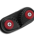 Cam cleat rope clutch, aluminum body, black with red end caps; close-up view for 4–6mm rope.