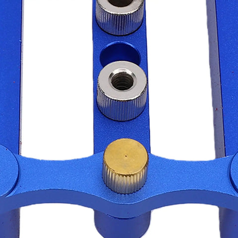 Close-up of Adjustable Dowel Jig Kit Featuring Self Centering Guide for precise drill alignment, showcasing steel liners.