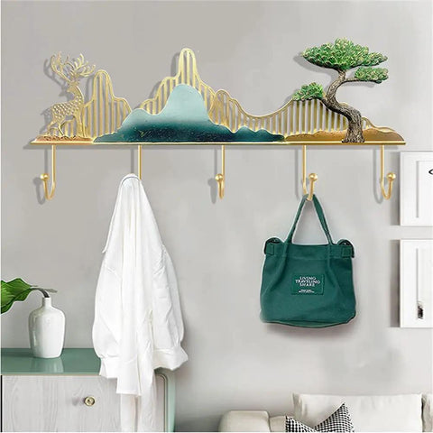 Heavy Duty Nordic Wall Hooks For No Fuss Everyday Home Organization Rust Resistant Iron Storage Rack With Slick Polished Design For Bathroom Kitchen Entryway Towel Scarf Coat And Keys with gold mountain design and hooks.