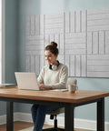 Premium Slick Self Adhesive Foam Panels 12 Pack Acoustic Wall Tiles For Soundproofing Home Theater Recording Studio Office Decor With No Fuss Peel And Stick Setup in a modern workspace.