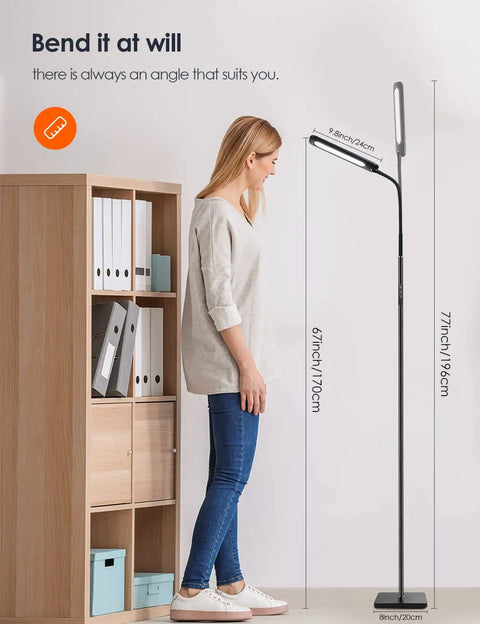 Woman adjusting Dimmable LED Floor Lamp With Remote Control, Adjustable 3000K To 6500K Color Temperature, Five Brightness Levels