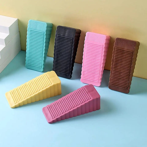 Six colorful wedges from the Eight Piece Rubber Door Stopper Wedge Set For Small Gaps Under 0.98 Inches Compact Lightweight Super Handy Non Slip Grip To Keep Doors From Slamming In Home Office Dorms on display