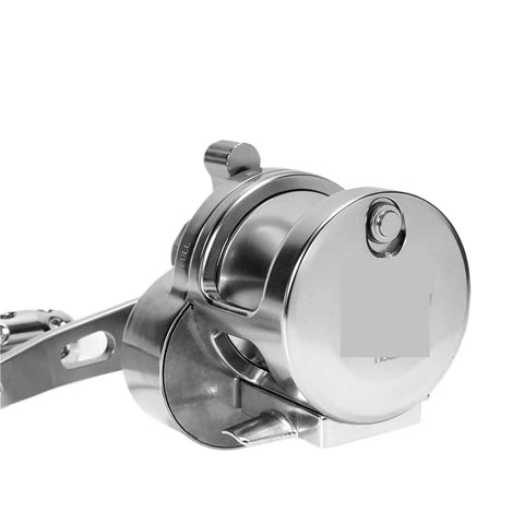 Close-up of Lever Drag Fishing Reel For Saltwater Big Game Beasts Angling Left Hand Trolling And Boat Casting Reel with metal body.