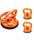 Heavy Duty Dent Puller Kit To Knock Out Stubborn Dings Quick Slick Suction Cup Paintless Auto Body Repair Tool 110 Lb Force with three suction cups.