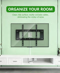 Wall Mounted TV Cord Hider Kit With Dual Outlet In-Wall Cable Management For Power And Low Voltage Cables, mounted on green wall.