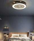 Sleek Minimalist Black Ceiling Fan With Three Speed Airflow And Three Color Dimming For Bedrooms And Offices providing quiet cooling above a bed.