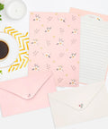 54 Piece Lined Stationery Set With Envelopes For Letters And Invitations Includes 36 Writing Papers And 18 Envelopes Six Cute Prints Ideal Gift For Office School Notes Poems with floral designs and matching envelopes.
