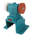 Hardcore Mini Bench Grinder Featuring A Rock Solid Mount Base That Zeroes Out Vibration Smooth Cordless Polisher And Sander Plays Nice With Standard 18V Batteries For Weekend Warriors in turquoise with two different grinding wheels.