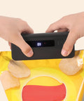 Two In One Mini Bag Sealer With 4.7 Inch Heat Sealer For Potato Chip Bags resealing a snack bag, hands operating the sealer