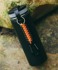Heavy Duty Carabiner Key Chain Set With Military Braided Paracord And Hook Clip D Ring, 2 Pack In Black Orange on a bottle