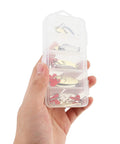 Hand holding tackle box with 10 Piece Metal Spoons Lures Kit With Hooks Tackle Box Hard Fishing Lures Sequin Baits For Trout Panfish Bass