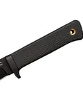 Close-up of SRK Compact Fixed Blade Knife handle with Kray-Ex material showing grip texture and lanyard hole.