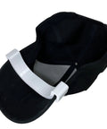 Hat Shaper Brim Bender Set for Perfect Curve on Fitted Hats Two Size Adjustable Tools for Custom Hat Shape Diy Friendly Build for Easy Use and Long Lasting Performance Made in USA showing curved tool on black hat.