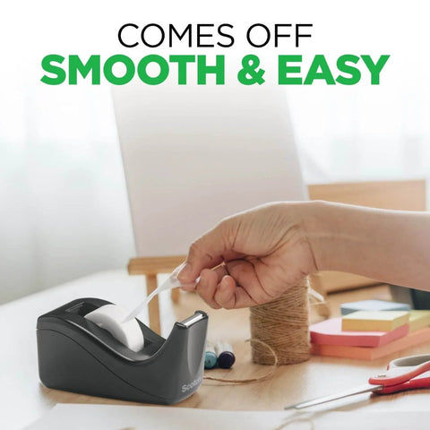 Alt Tag: Deluxe Black Desktop Tape Dispenser With Weighted Non Skid Base For One Handed Dispensing Holds 1 Inch Core Tape in use
