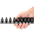 Hand holding 3/8 Inch Drive Shallow External Star Impact Socket Set With Rail, 12-Piece (E4-E20) for quick bolt busting.