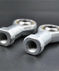 Built Tough Self Aligning Rod End Bearings With Smooth Threading Male Female Joint Rods close-up of threaded steel rod ends.