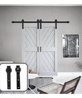 Sliding Barn Door Hardware Kit with J Shaped Hangers for 4 to 9.6 Ft Double Doors in Black Finish installed in living room