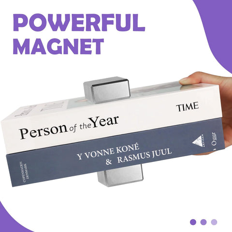 Front view of a silver neodymium block magnet (40x40x20 mm) clamping two books.