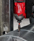 Shockwave Impact Duty Step Bits Set For Metal With Rapid Strike Tip drilling into metal surface with impact driver in use