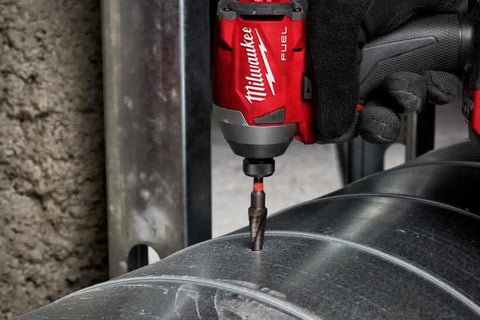 Shockwave Impact Duty Step Bits Set For Metal With Rapid Strike Tip drilling into metal surface with impact driver in use