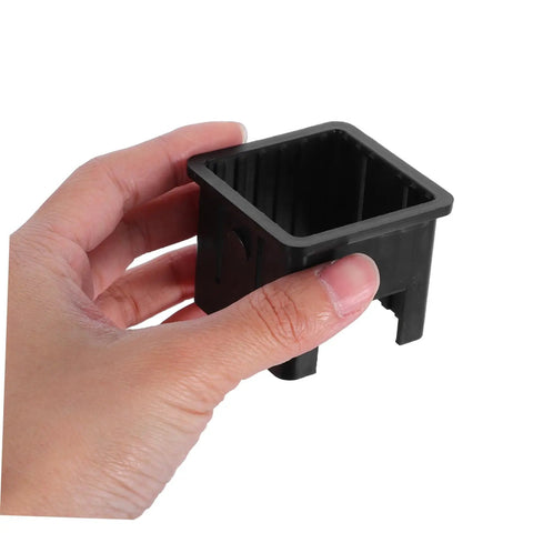 Rock Solid Hollow Tube Bushing Sleeves 4 Pack Top Shelf Durable Steel Adapter Reducers For Home Gym Machines Seamless Conversion 50Mm To 40Mm Frame Tubes Built Tough, hand holding black plastic sleeve.