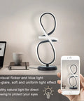 Sleek Black Modern Table Lamp With Touch Control 17 Inch LED Dimmable Spiral Metal Desk Light 3 Color Temperature on desk