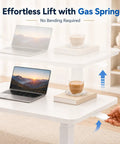 Mobile Rolling Desk Featuring Hidden Wheels And Smooth Pneumatic Height Adjustment Portable Laptop Stand For Home Office Or Bedside Setup showcasing gas spring lift mechanism.