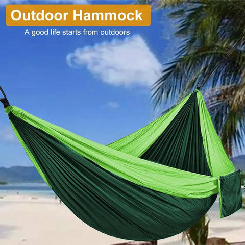 All In One Camping Hammock With Heavy Duty Tree Straps 660 Lb Capacity Portable Outdoor Hammock on a beach