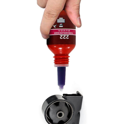 Applying Purple Threadlocker High Strength Oil Resistant Anaerobic Adhesive For Screws And Bolts Locking Solution to a mechanical part.