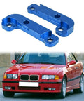 Drift Lock Adapter Kit For E46 M3 Boosts Front Steering Angle By 25 Percent in blue CNC aluminum beside red E46 M3