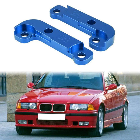 Drift Lock Adapter Kit For E46 M3 Boosts Front Steering Angle By 25 Percent in blue CNC aluminum beside red E46 M3