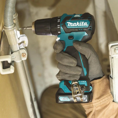 Badass 12v Max Lithium Ion Cxt Brushless Drill Driver Featuring Electric Brake And Bright Led Lamp Keyless Chuck Compact Heavy Duty Cordless Tool Built Different For Real World Projects in use, detailed close-up.