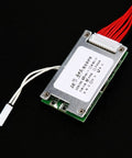 Hassle Free 36V 10S Lithium Battery BMS Featuring 30A Smart Balancing Protection Board, circuitry with wires, compact design.