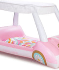 Oversized Inflatable Golf Cart Pool Float With Removable Fringe Canopy And Retro Styling Heavy Duty Vinyl two seater water lounger in pink.