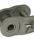 Close-up of Roller Chain Offset Link 4-Pack for 50 Pitch Chains, dark grey finish, meets ASME ANSI B29.1 standards, shown from side view.