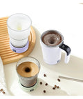 Self Stirring Coffee Mug With Automatic Magnetic Mixing And Smart Temp Sensor Usb Rechargeable Travel Cup That Keeps Your Brew Piping Hot For Zero Hassle Smooth Sippin Every Damn Morning Purple on a table with coffee