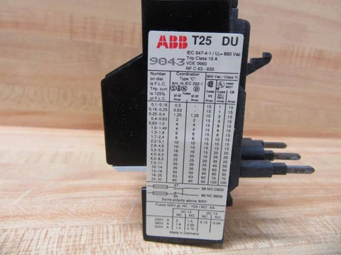 Single overload relay T25DU32 24-32 A 3-pole thermal motor protector on a wooden surface