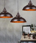 Three Industrial Nautical Barn Pendant Light With Rustic Bowl Shape Ceiling Fixtures in kitchen setting, rust finish.