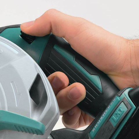 Close-up of hand gripping 18V LXT Brushless Cordless Circular Saw Tool Only With Six And A Half Inch Blade Automatic Speed Change 5000 RPM Pro Grade Power For Framing And Trim Lightweight Durable No Battery Included handle, showcasing control features.