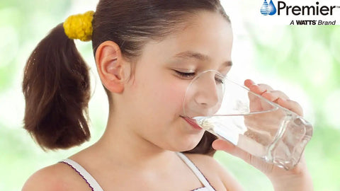 Child drinking water representing the benefits of PH Balancing Ceramic Post Filter For Your RO Setup With One Quarter Inch Quick Connect