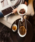 Elevate Your Daily Grind With This Dope 3-In-1 Coffee Kettle, Cold Brew And Ice Drip Maker, Manual Filter Teapot For Smooth Lattes And Cappuccinos, Matte Black Finish with tea brewing setup and honey.